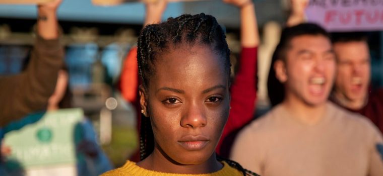close-up-people-protesting-together_23-2148971025